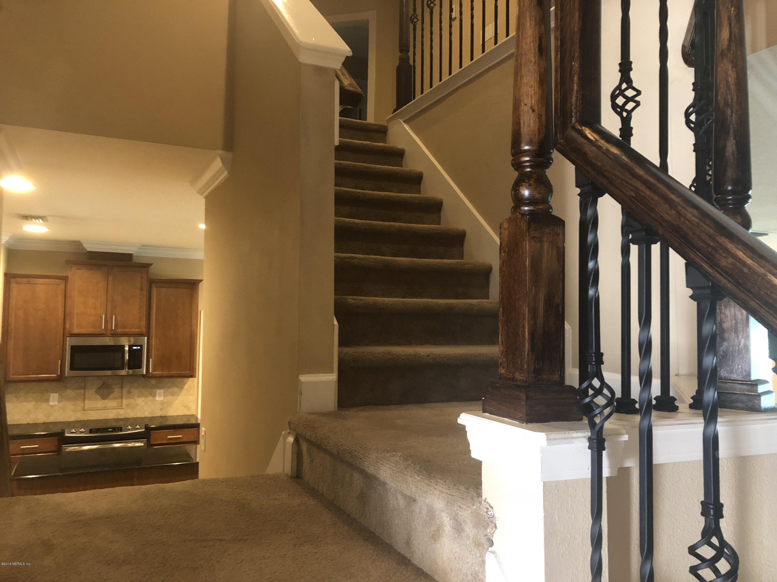 732 Castledale Court St. Johns, FL 32259 - Photo 6 of 51 a view of entryway and hall with wooden floor