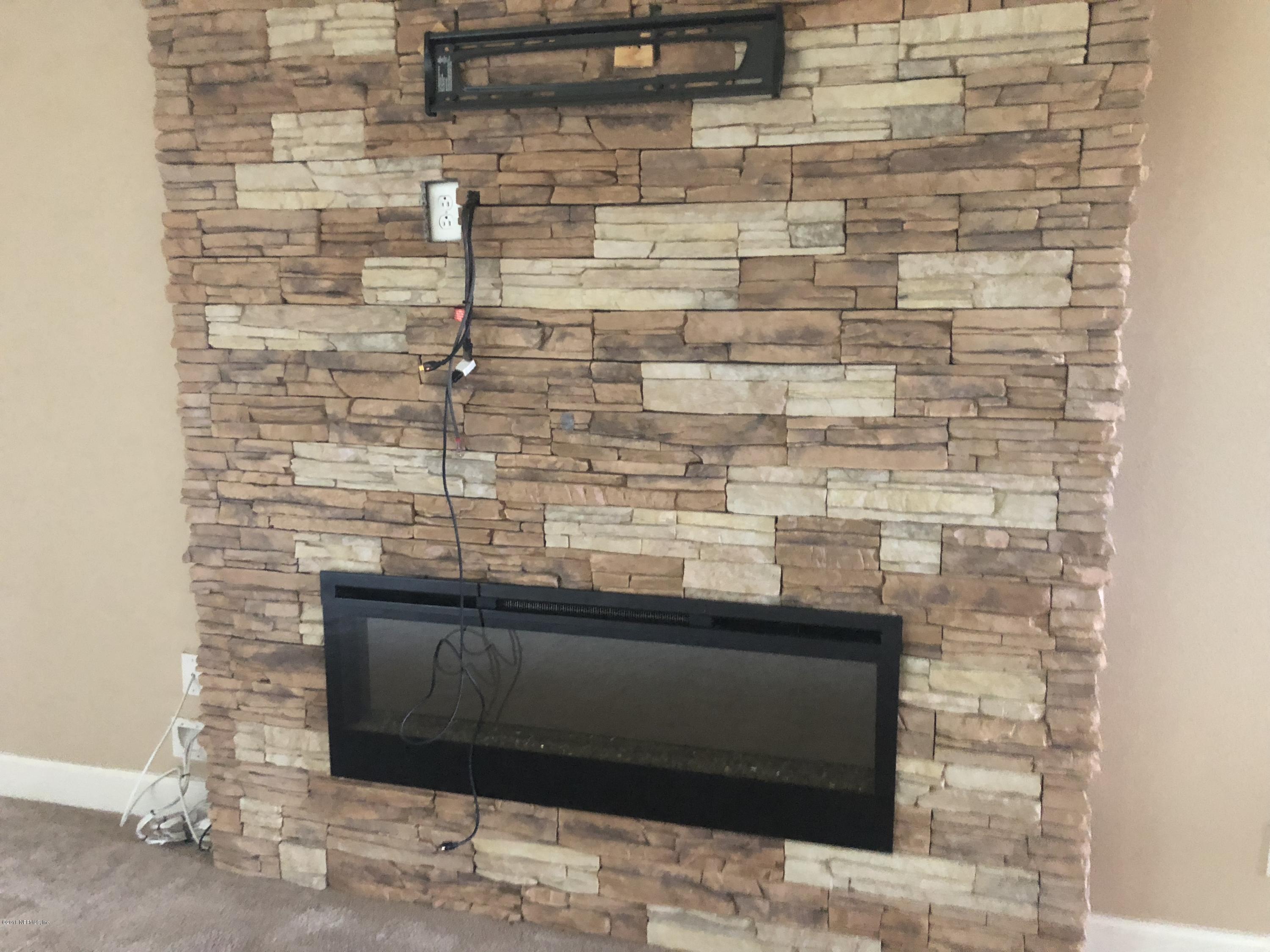 732 Castledale Court St. Johns, FL 32259 - Photo 7 of 51 a bathroom with a sink and a mirror