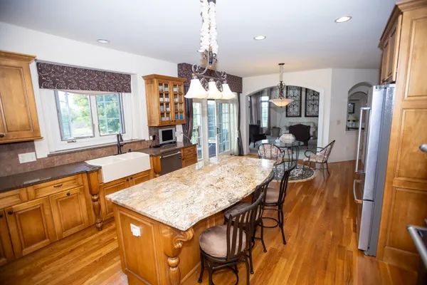 a view of a dining room with furniture window and outside view