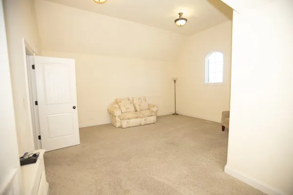 a view of a room with white walls