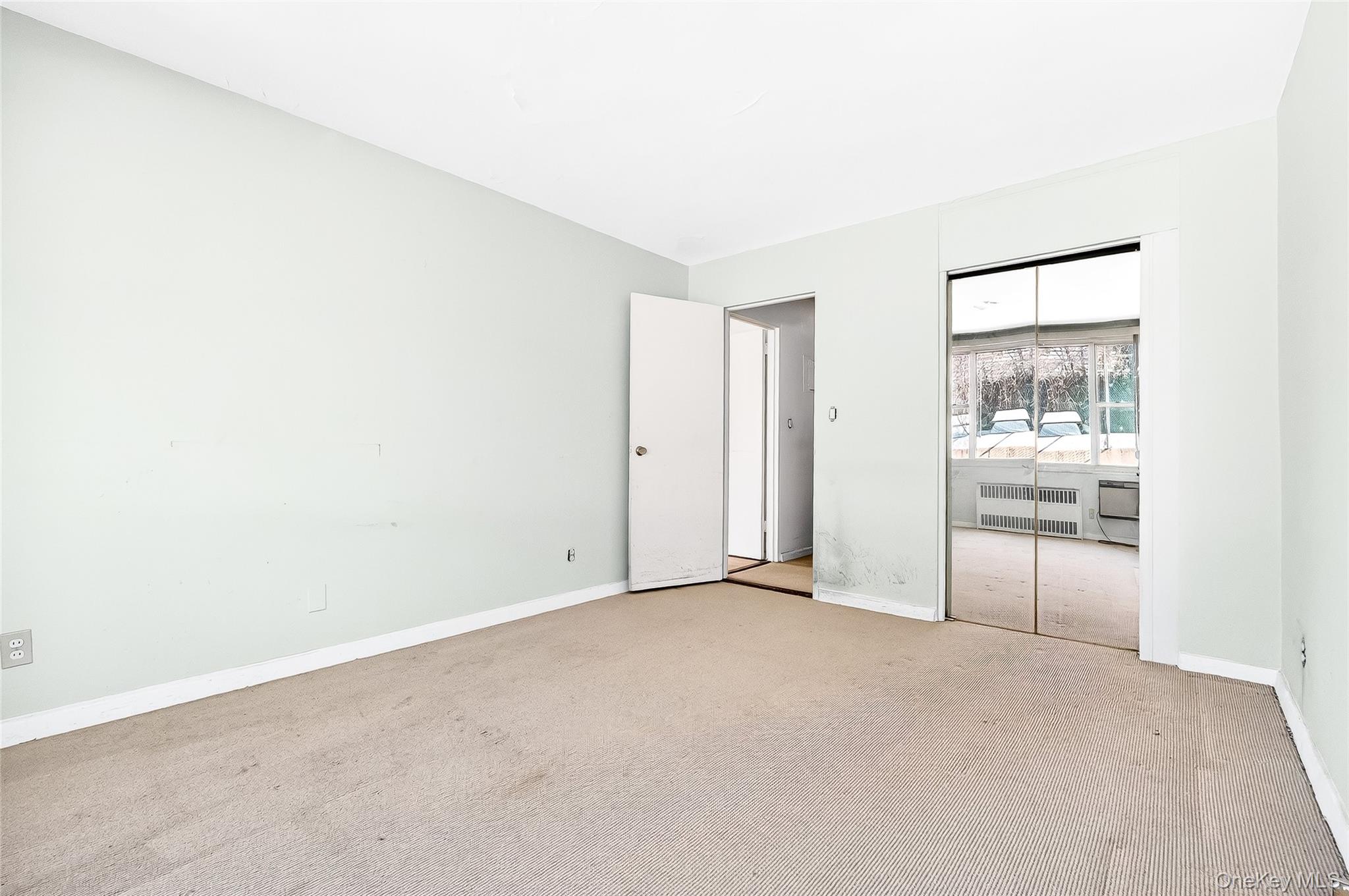 12 Old Mamaroneck Road, Unit 2G White Plains, NY 10605 - Photo 28 of 38 an empty room with a empty space and windows