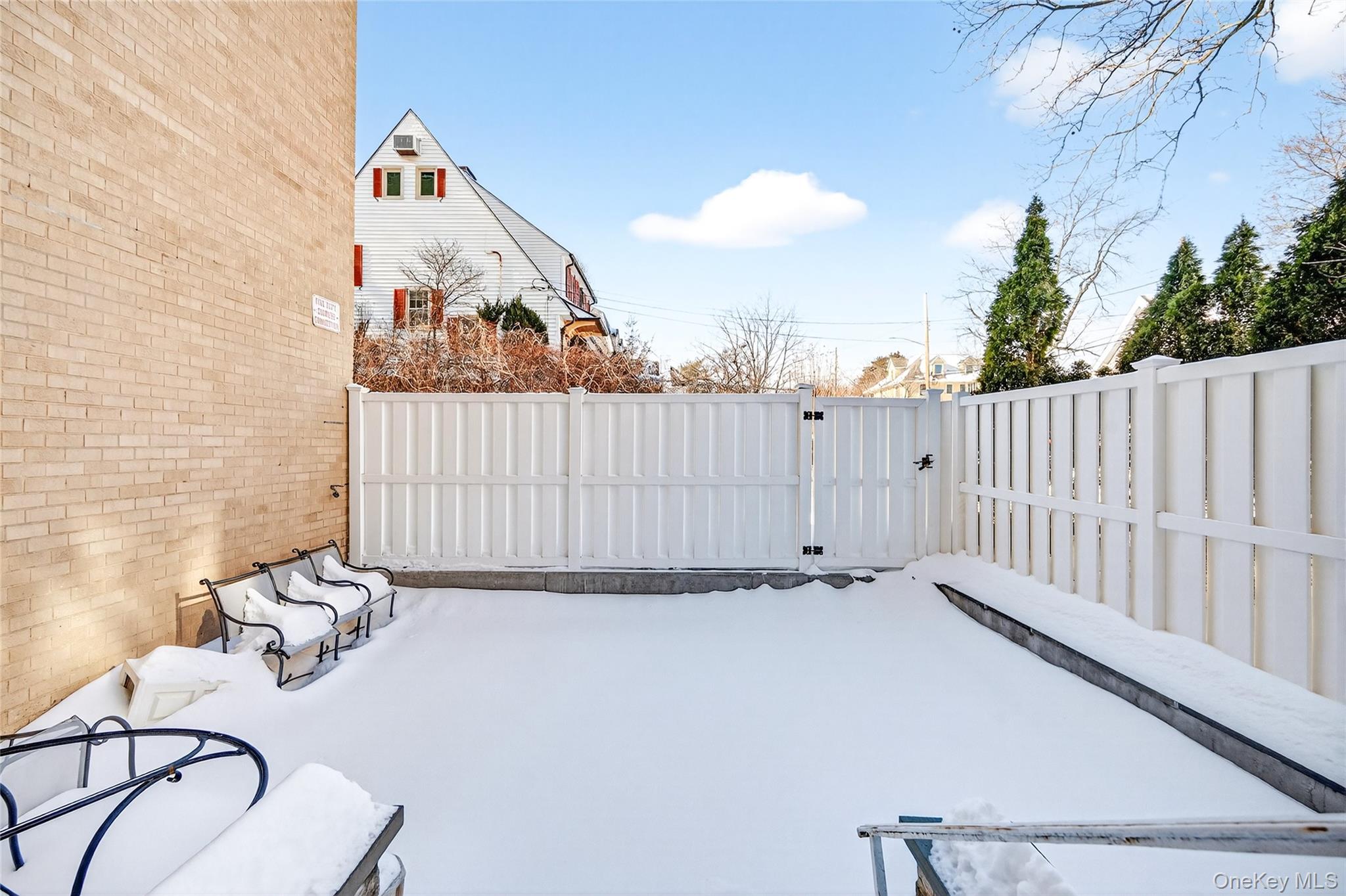 12 Old Mamaroneck Road, Unit 2G White Plains, NY 10605 - Photo 33 of 38 a view of a backyard with furniture