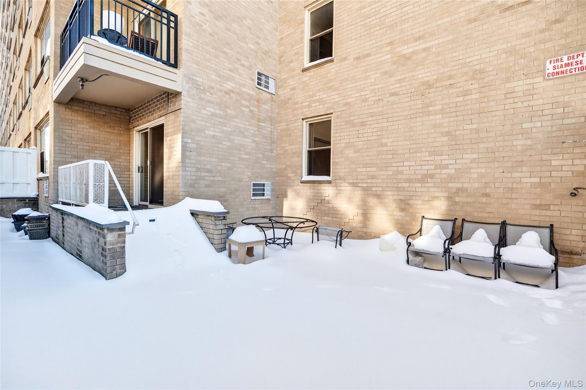 12 Old Mamaroneck Road, Unit 2G White Plains, NY 10605 - Photo 35 of 38 a view of a patio with couple of chairs and a couch