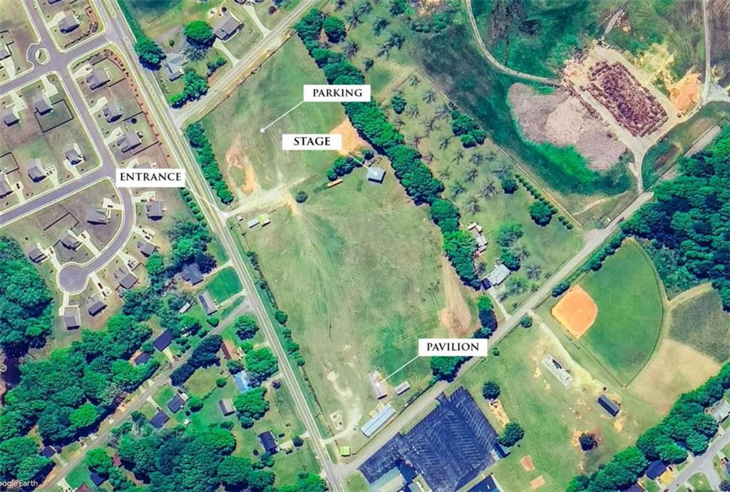 1320 East Church Street Monroe, GA 30655 - Photo 13 of 15 an aerial view of a house