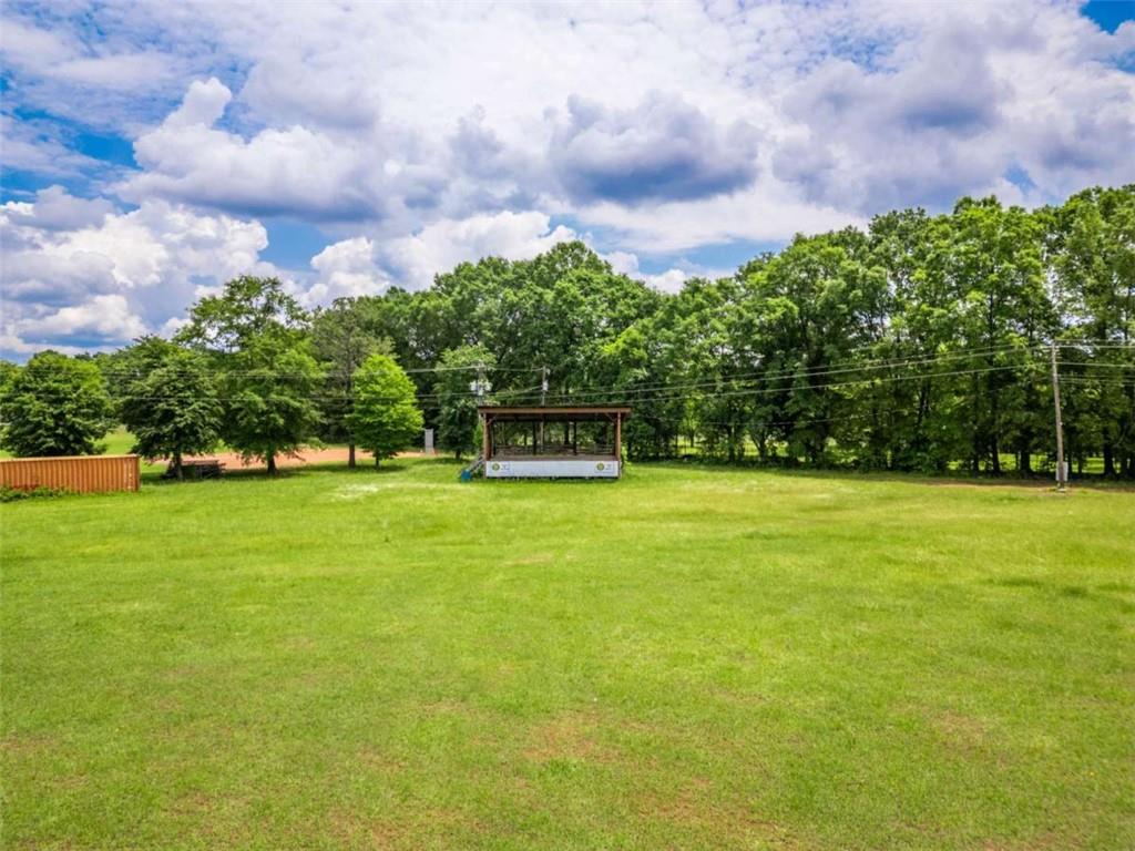 1320 East Church Street Monroe, GA 30655 - Photo 3 of 15 a view of a garden
