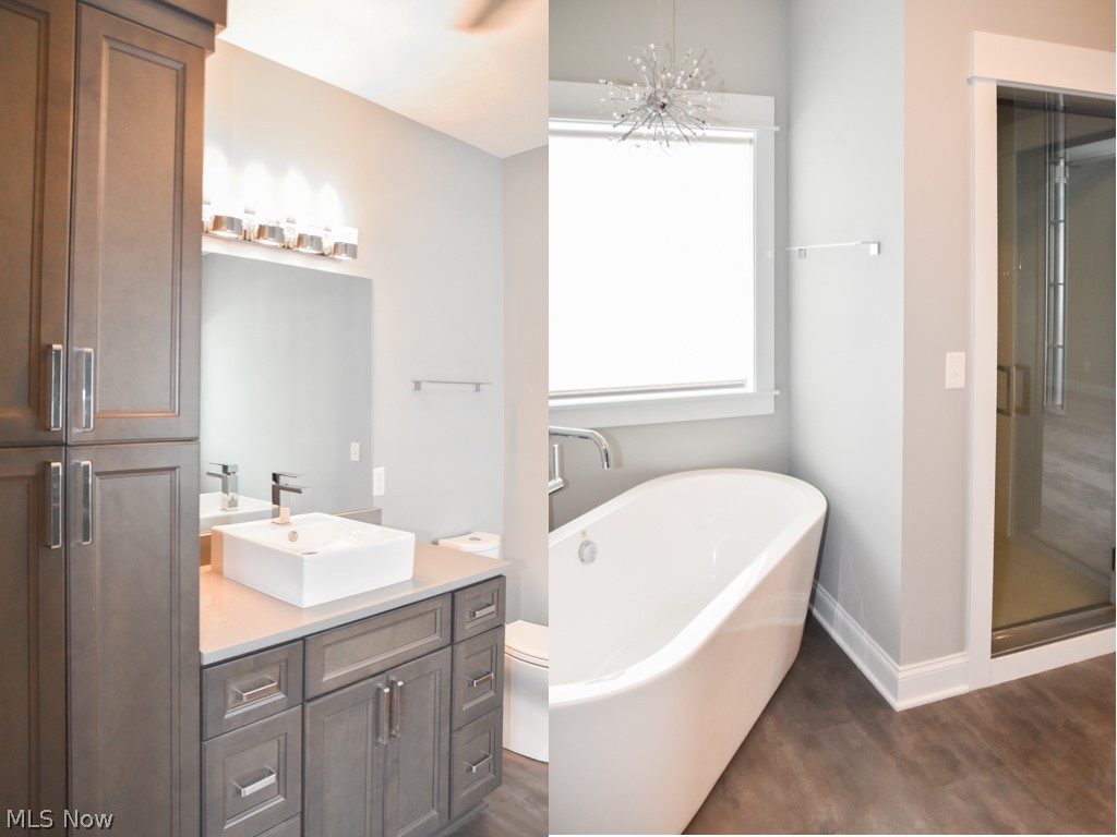 5785 Birmingham Road Northeast Canton, OH 44721 - Photo 9 of 21 Private master bath with a freestanding tub and tiled shower.