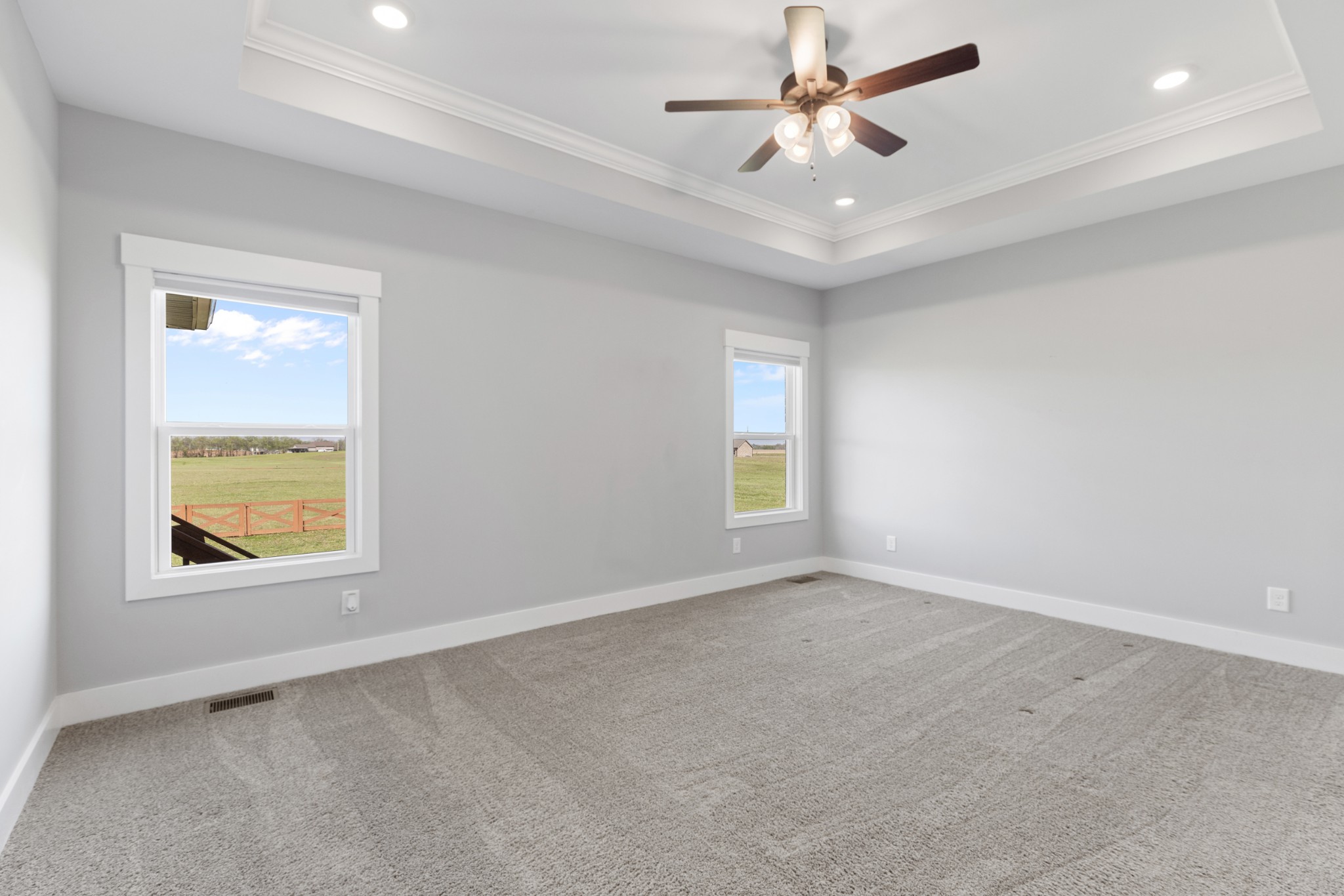 5450 Highway 431 Springfield, TN 37172 - Photo 22 of 54 an empty room with a window and a ceiling fan