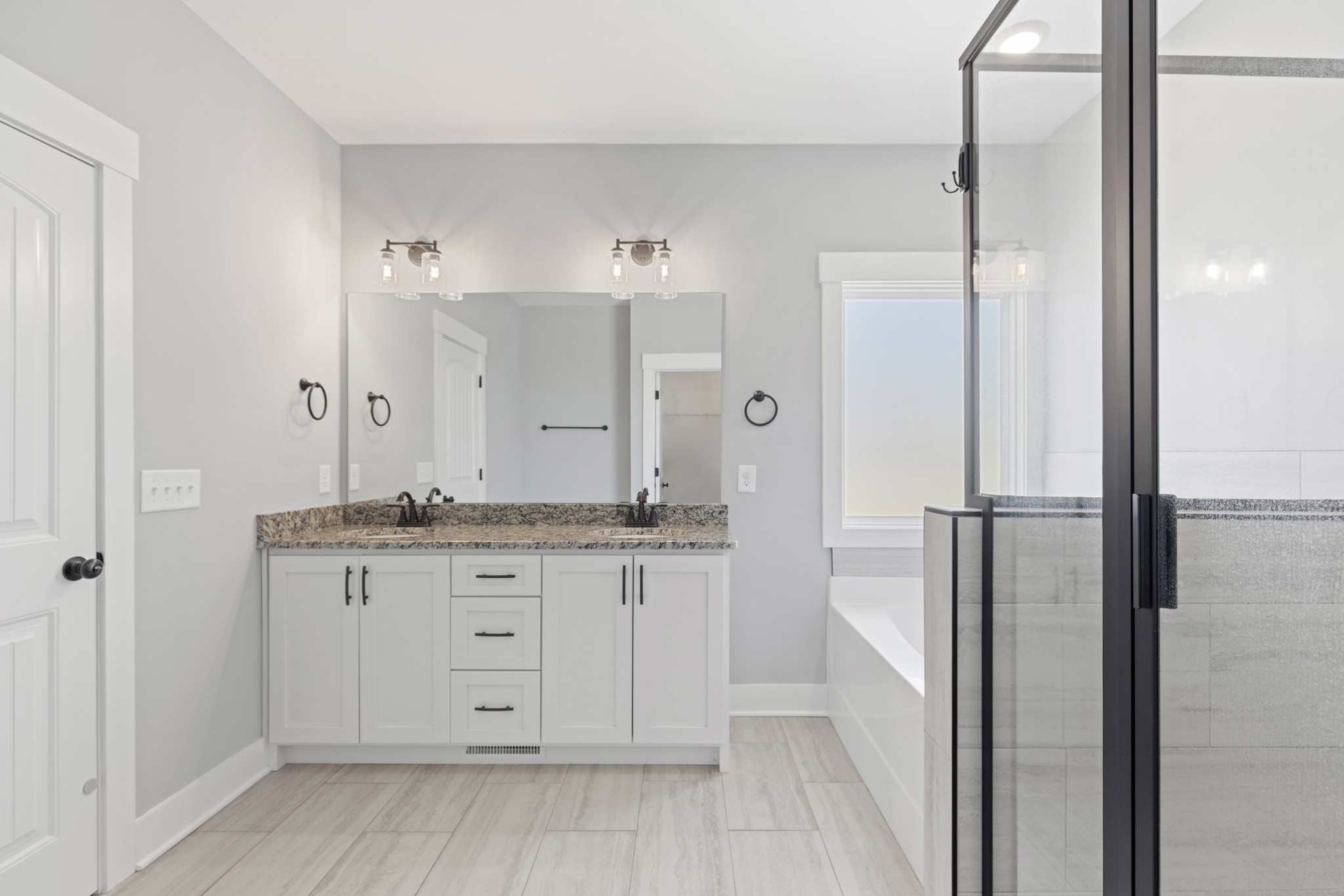 5450 Highway 431 Springfield, TN 37172 - Photo 29 of 54 a bathroom with a granite countertop sink shower and a mirror