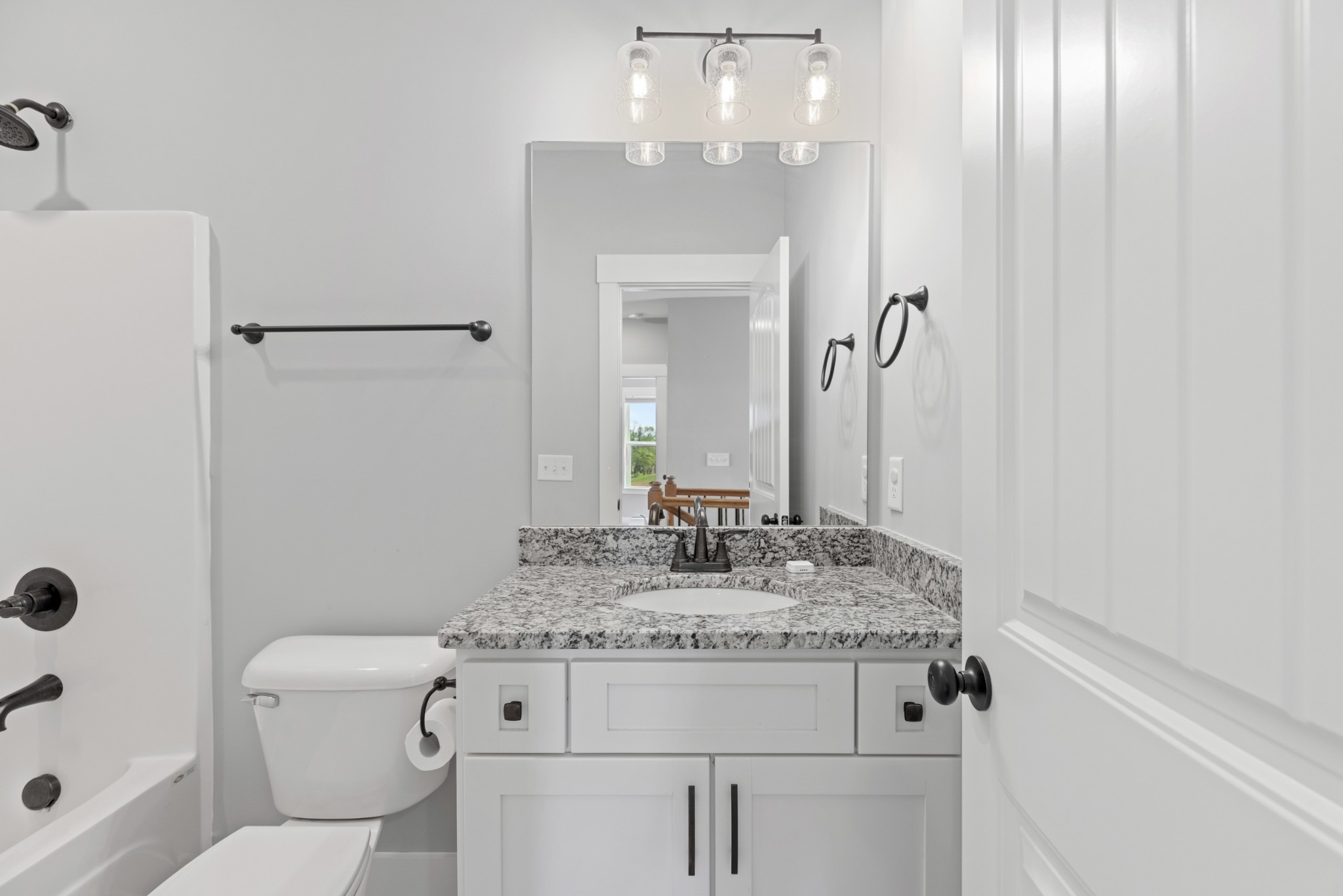 5450 Highway 431 Springfield, TN 37172 - Photo 37 of 54 a bathroom with a granite countertop sink toilet and shower