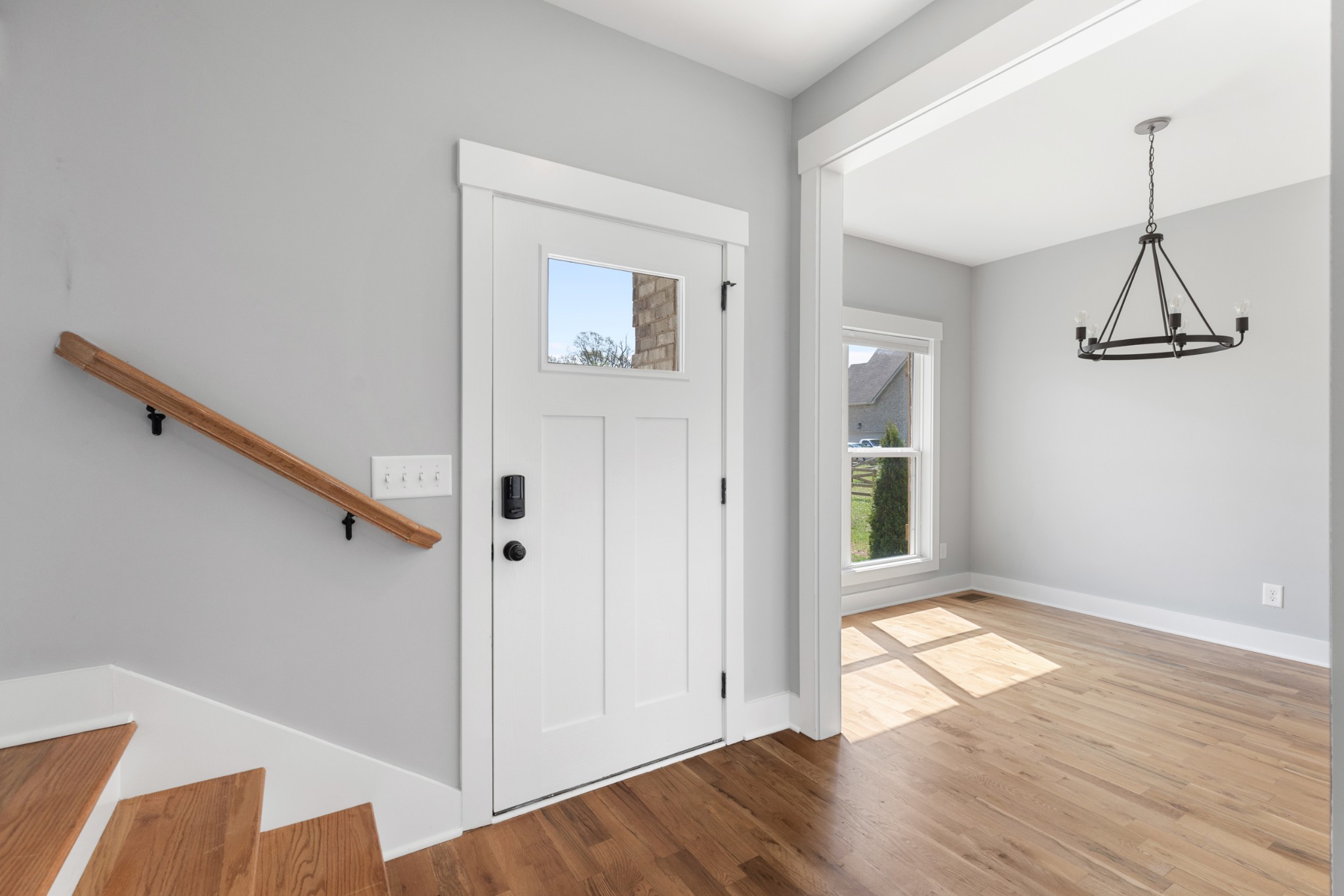 5450 Highway 431 Springfield, TN 37172 - Photo 6 of 54 an empty room with wooden floor and windows