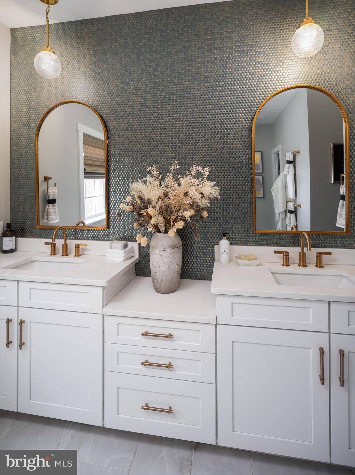 200 Gable Drive, Unit DEVONSHIRE Perkiomenville, PA 18074 - Photo 36 of 50 a bathroom with a sink mirror and