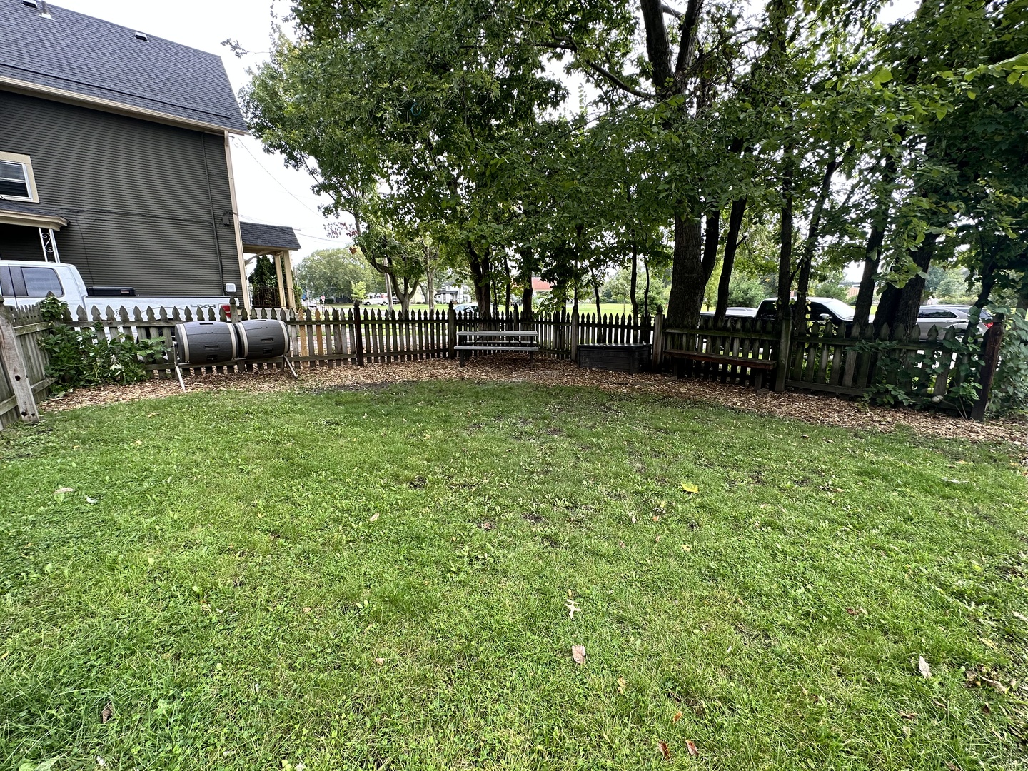 103 North View Street, Unit C Aurora, IL 60506 - Photo 12 of 13 a view of a backyard with a garden