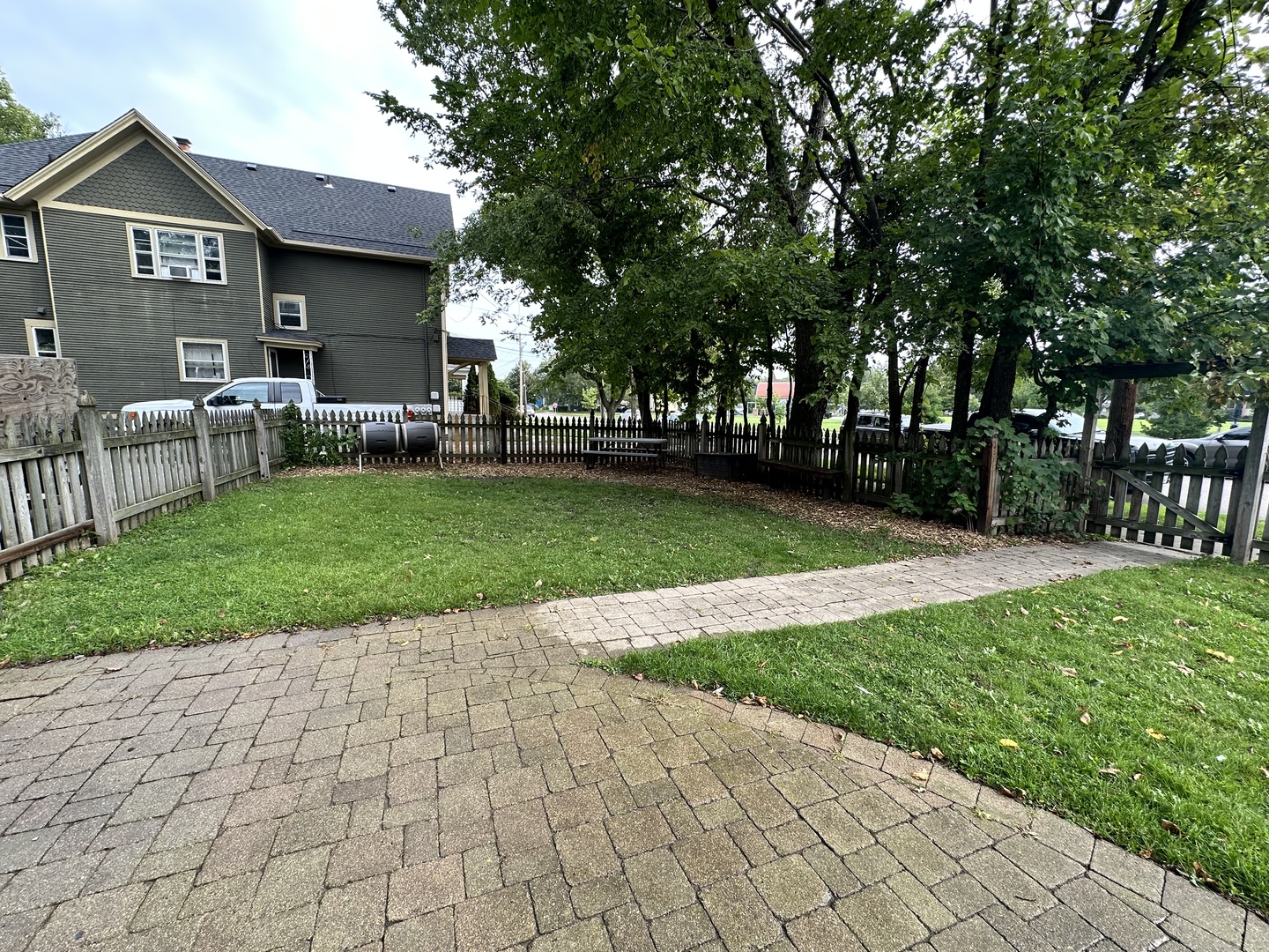 103 North View Street, Unit C Aurora, IL 60506 - Photo 13 of 13 a front view of a house with garden