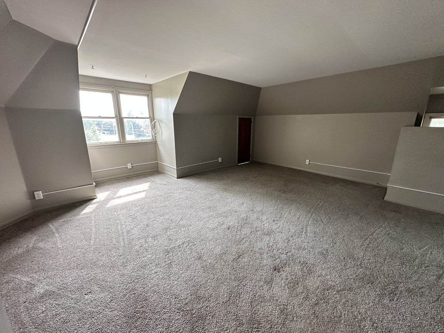 103 North View Street, Unit C Aurora, IL 60506 - Photo 2 of 13 an empty room with windows