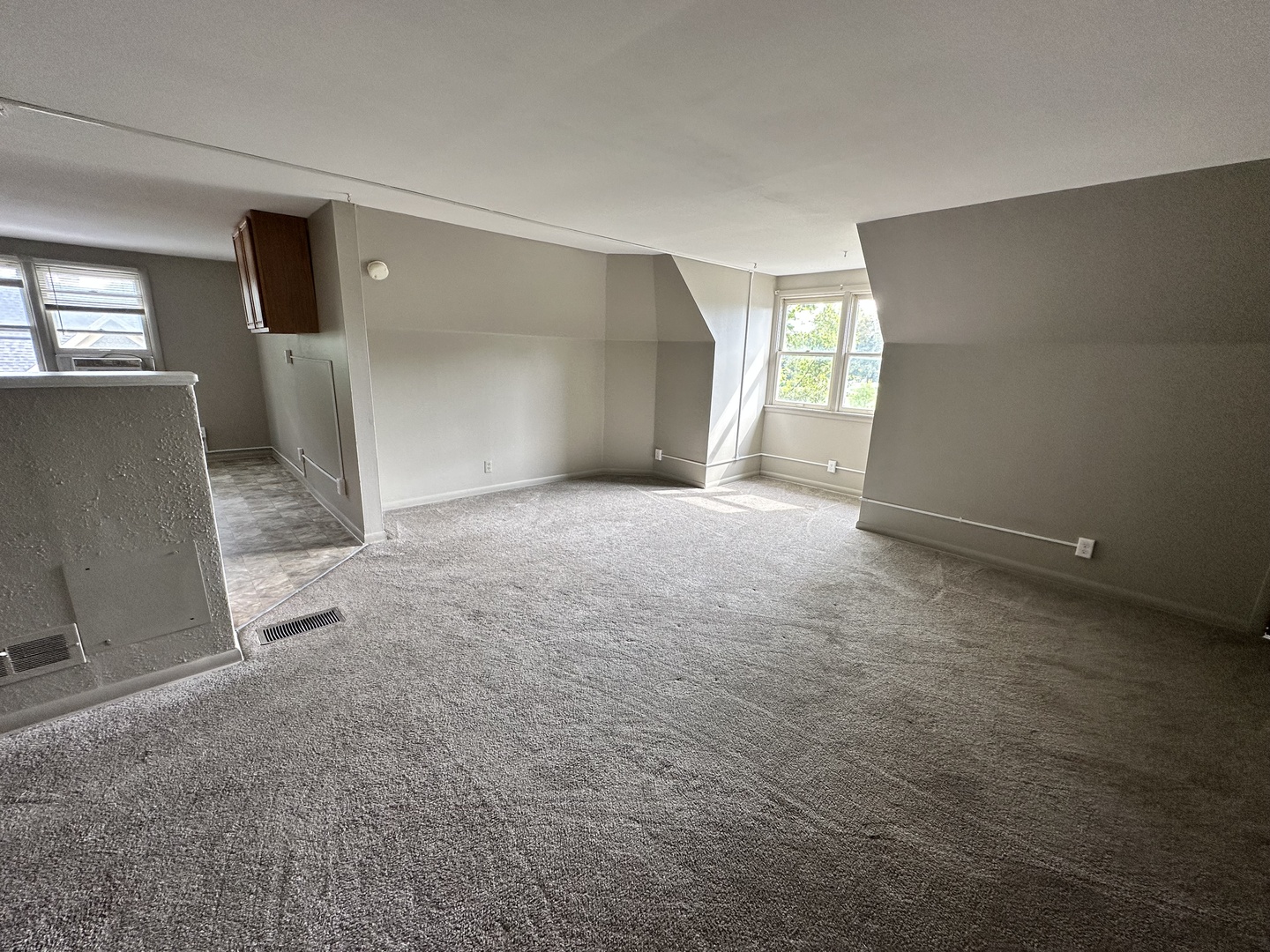 103 North View Street, Unit C Aurora, IL 60506 - Photo 3 of 13 a view of an empty room with a window