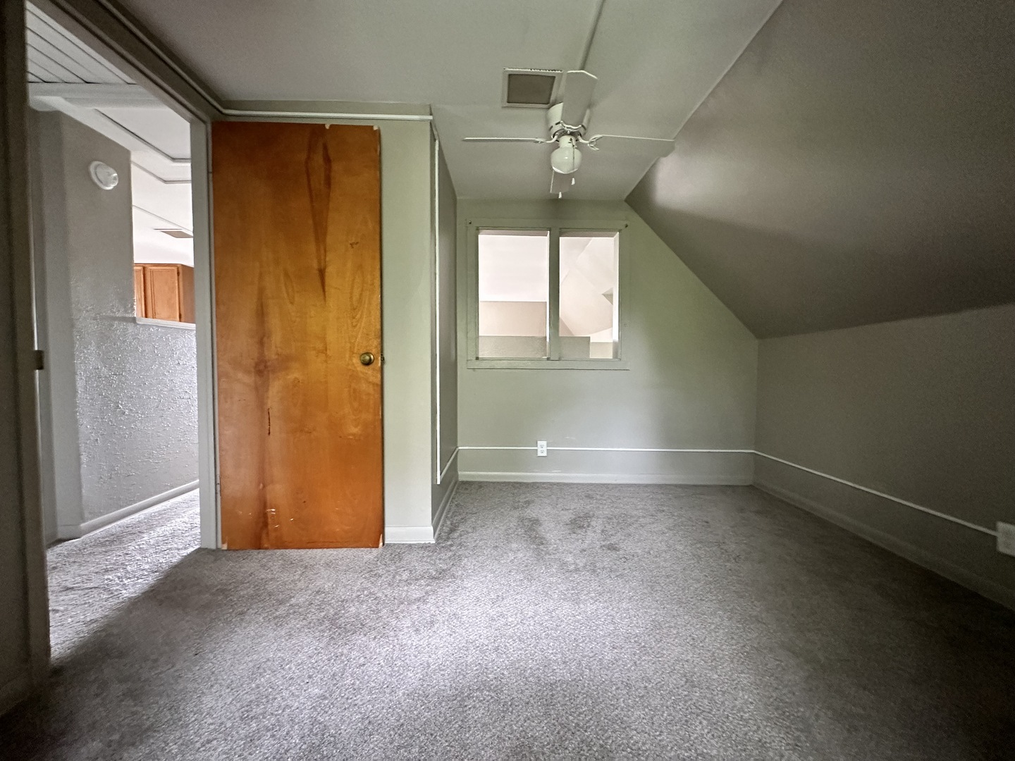 103 North View Street, Unit C Aurora, IL 60506 - Photo 8 of 13 an empty room with windows and entrance