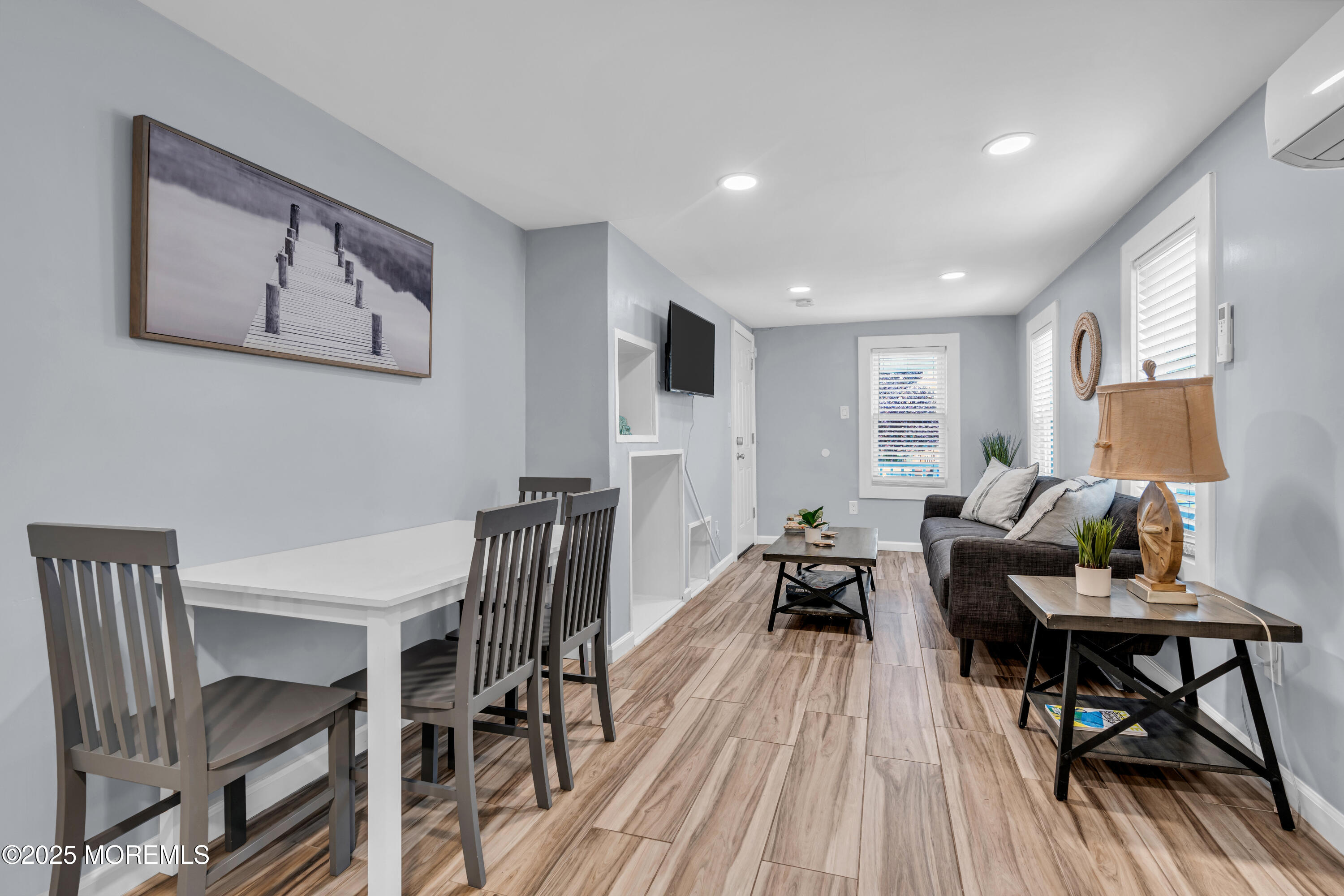 68 Clark Avenue, Unit 1E Ocean Grove, NJ 07756 - Photo 5 of 13 a view of a dining room with furniture window and wooden floor