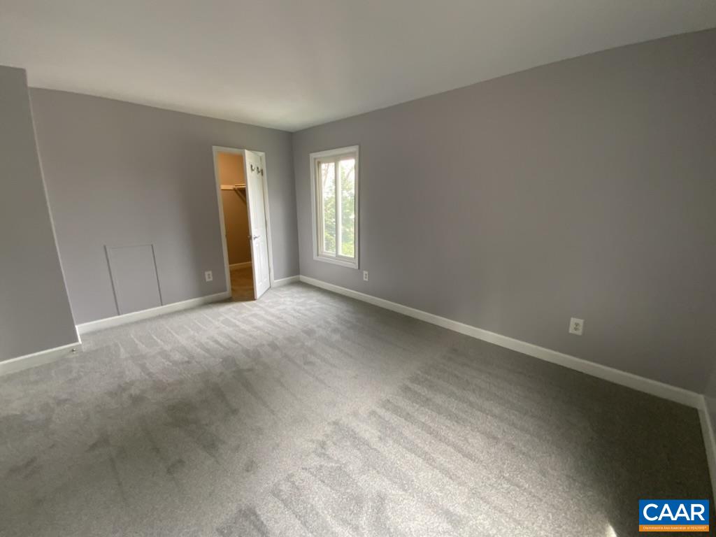 117 Berry Street, Unit 12 Orange, VA 22960 - Photo 6 of 10 a view of an empty room with window