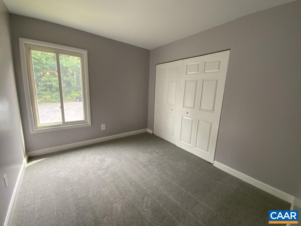 117 Berry Street, Unit 12 Orange, VA 22960 - Photo 8 of 10 an empty room with windows