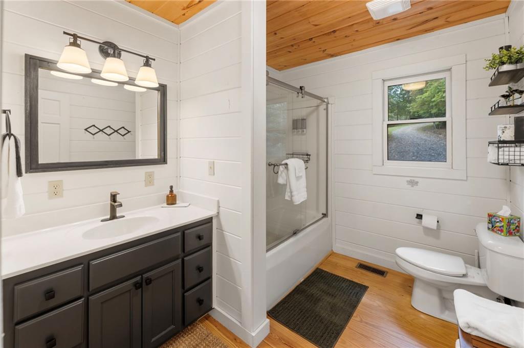 120 Brookhaven Trail Blue Ridge, GA 30513 - Photo 27 of 93 a bathroom with a sink toilet and shower