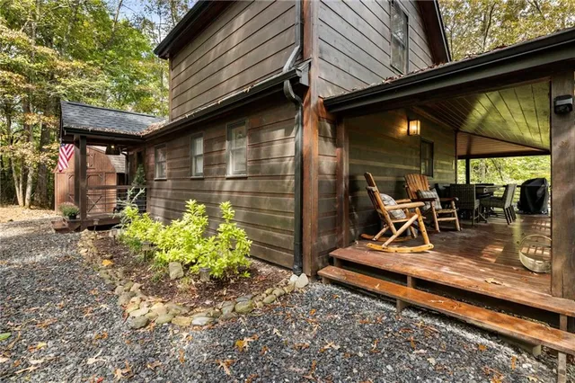a outdoor dining space with furniture and outdoor view