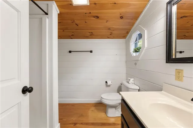 a view of a tree in a yard