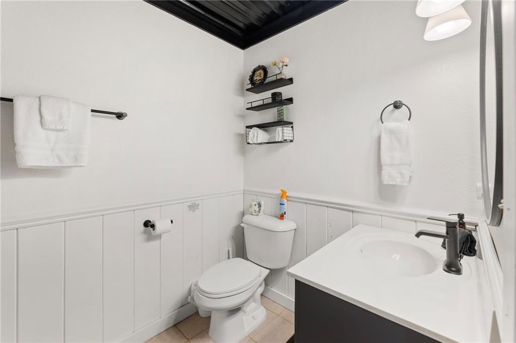 120 Brookhaven Trail Blue Ridge, GA 30513 - Photo 63 of 93 a bathroom with a sink a toilet and vanity