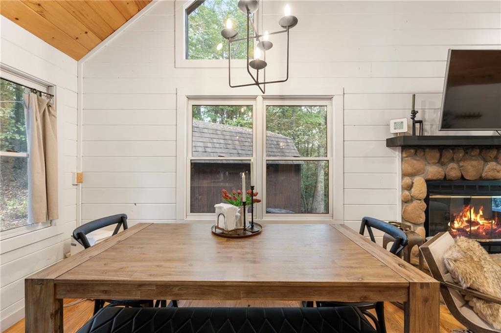 120 Brookhaven Trail Blue Ridge, GA 30513 - Photo 10 of 93 a dining room with a table chairs and a fireplace