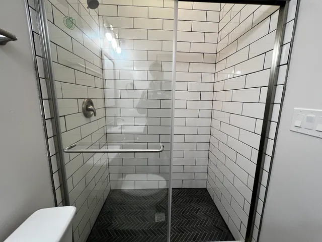 a bathroom with a sink and toilet