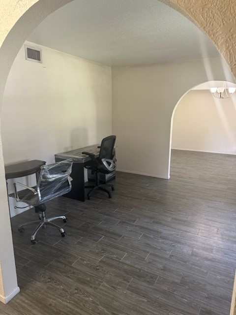 3862 Wichita Street Houston, TX 77004 - Photo 3 of 20 a view of a workspace with wooden floor