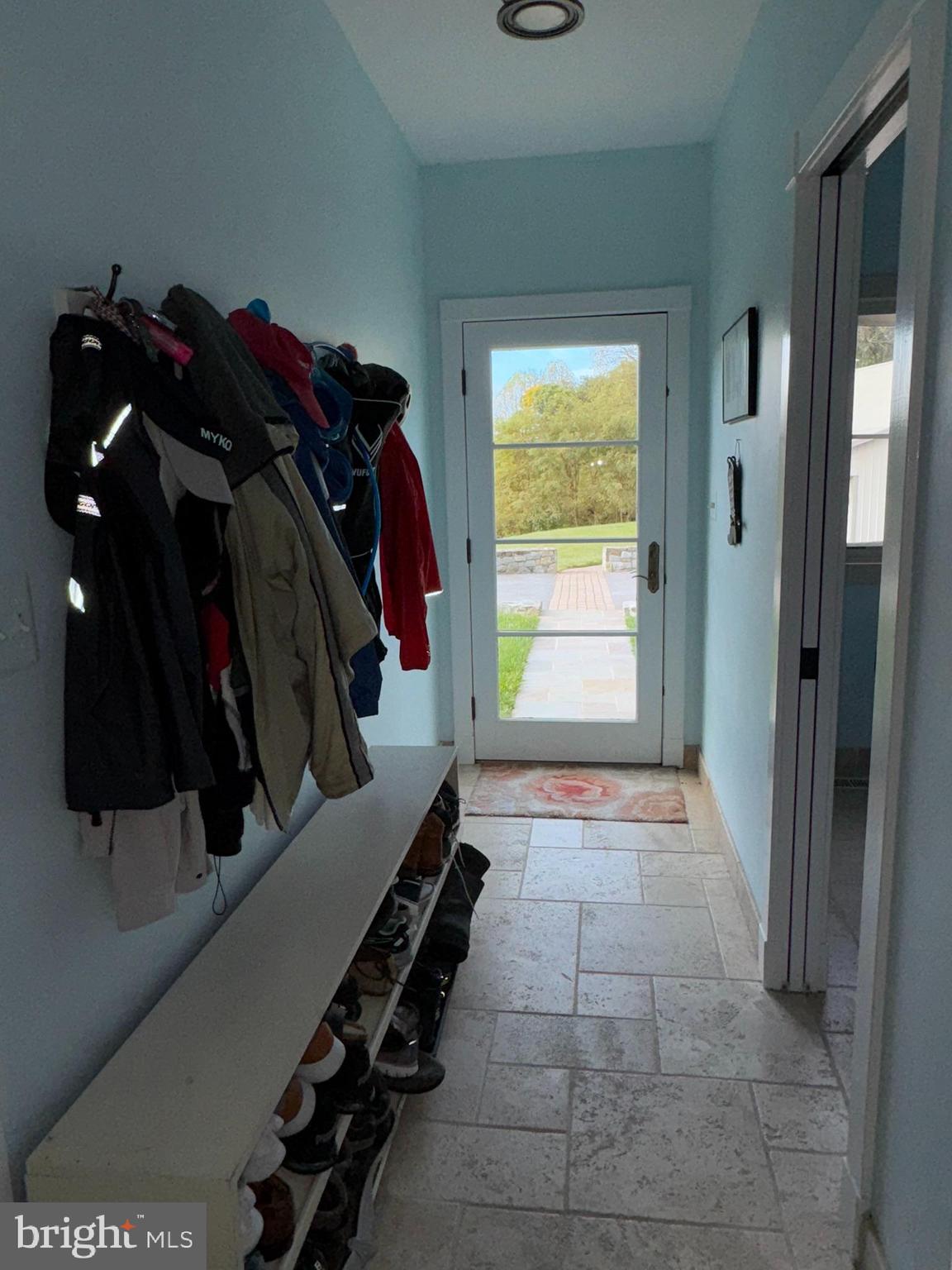 16704 Thurston Road Dickerson, MD 20842 - Photo 14 of 101 a view of walk in closet with clothes and shoes