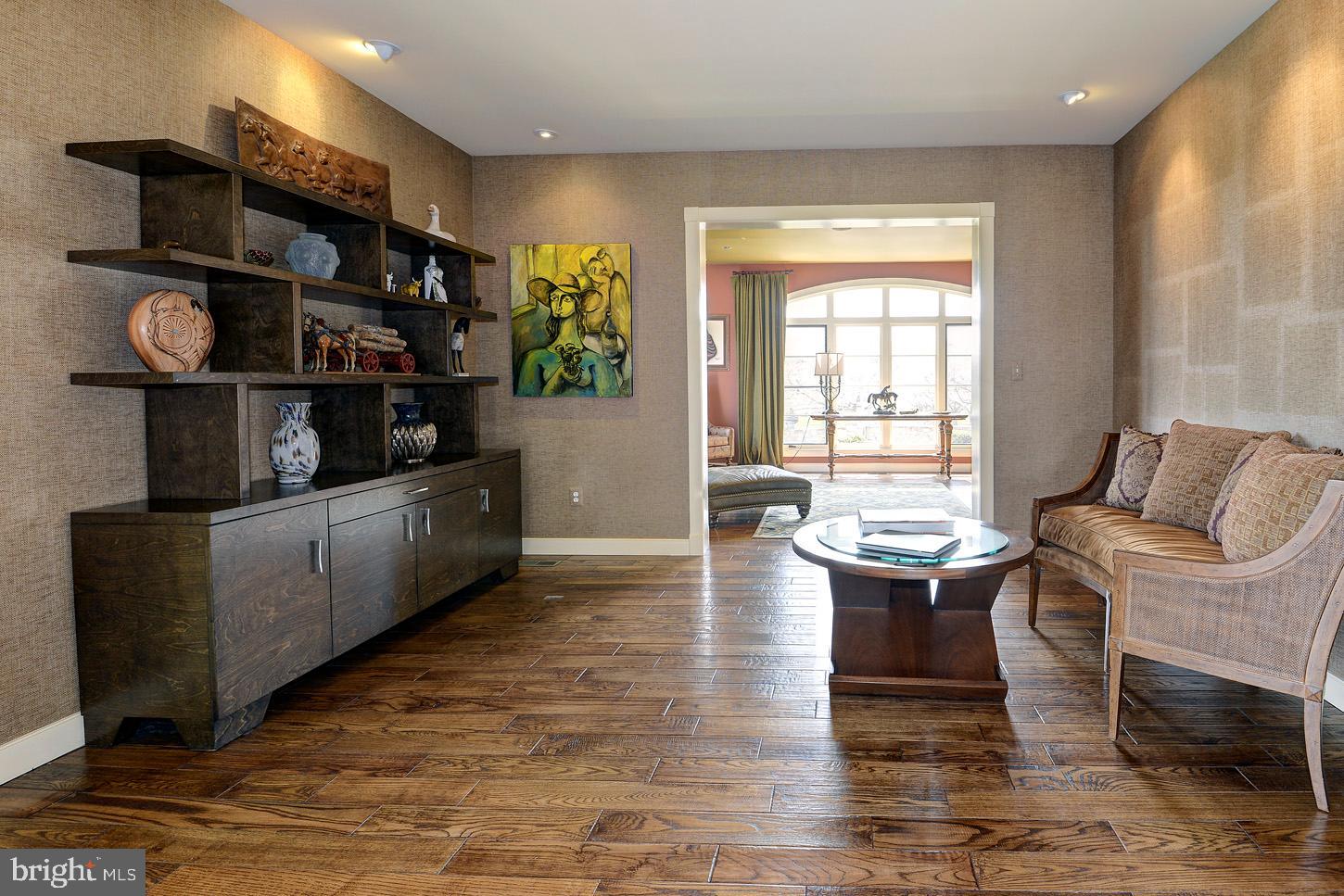 16704 Thurston Road Dickerson, MD 20842 - Photo 27 of 101 a living room with furniture and a wooden floor