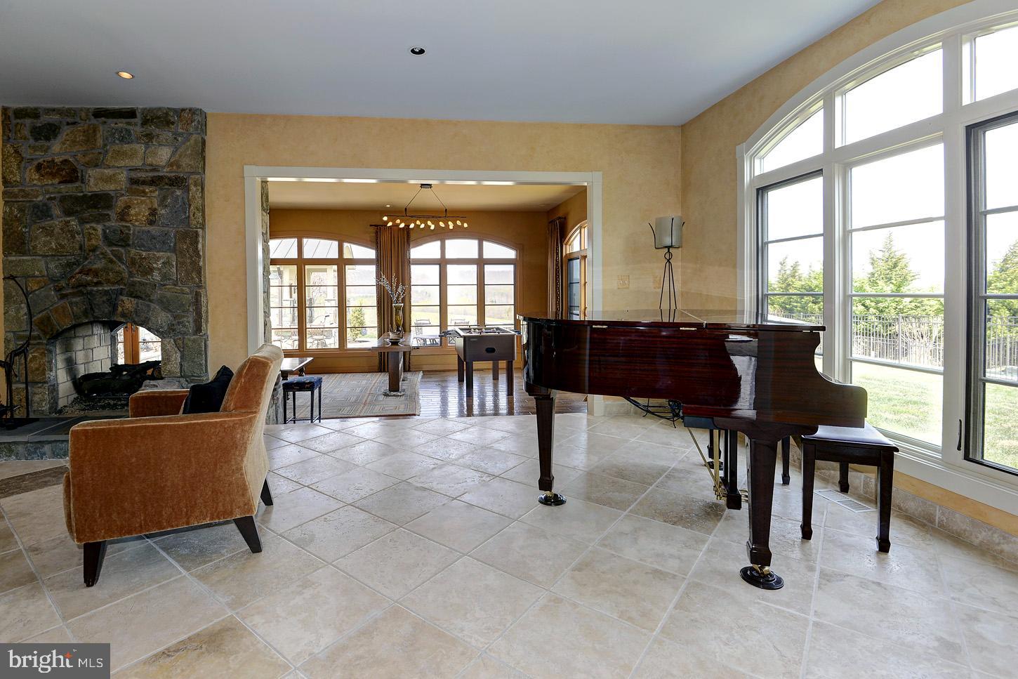 16704 Thurston Road Dickerson, MD 20842 - Photo 28 of 101 a living room with furniture and a large window