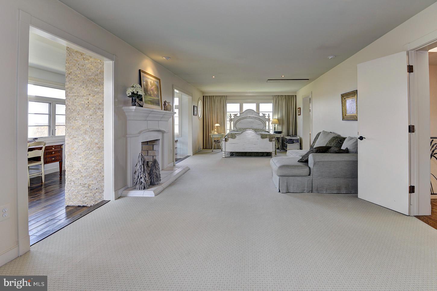 16704 Thurston Road Dickerson, MD 20842 - Photo 50 of 101 a living room with furniture and a fireplace