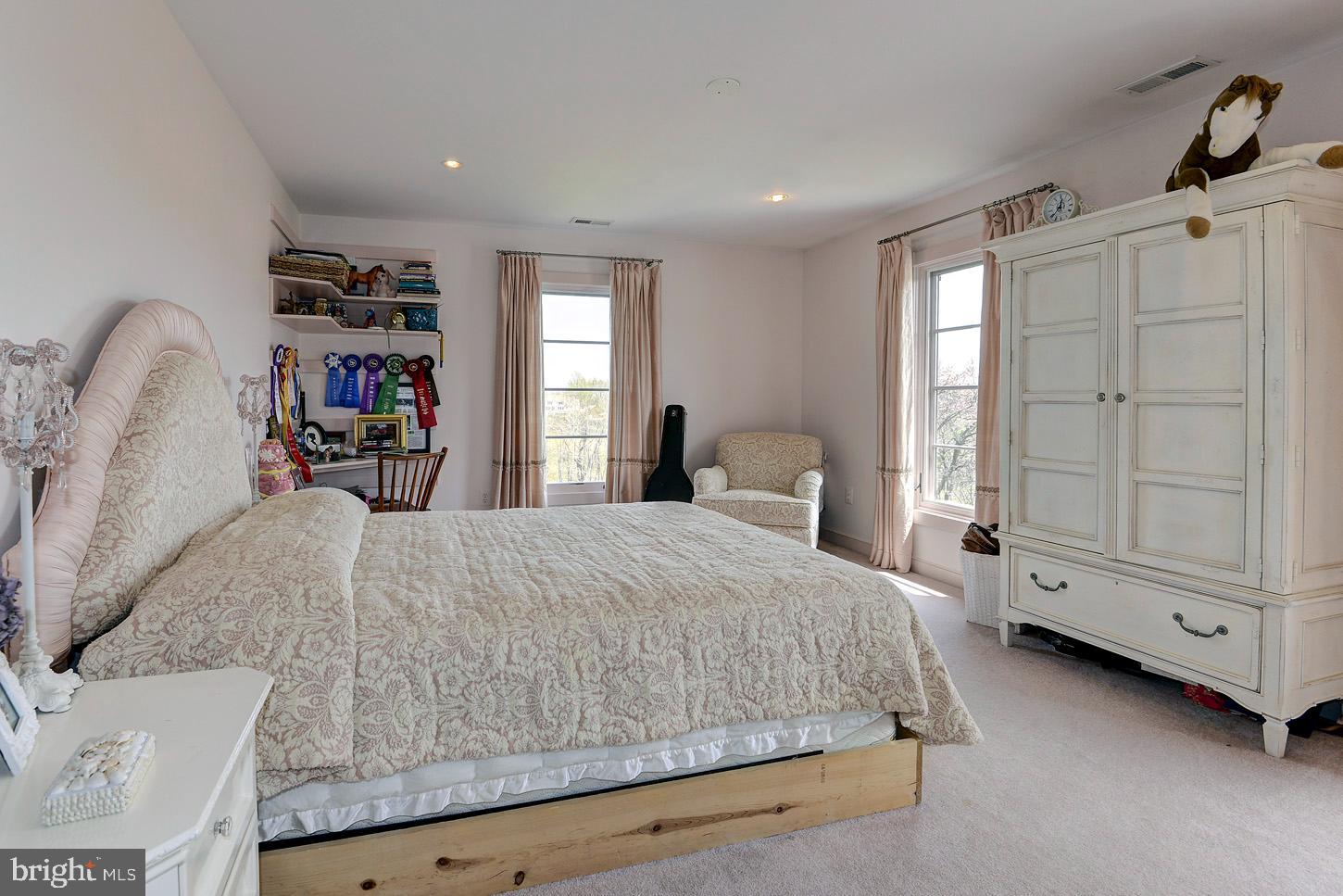 16704 Thurston Road Dickerson, MD 20842 - Photo 61 of 101 a bedroom with a bed a dresser and next to a window