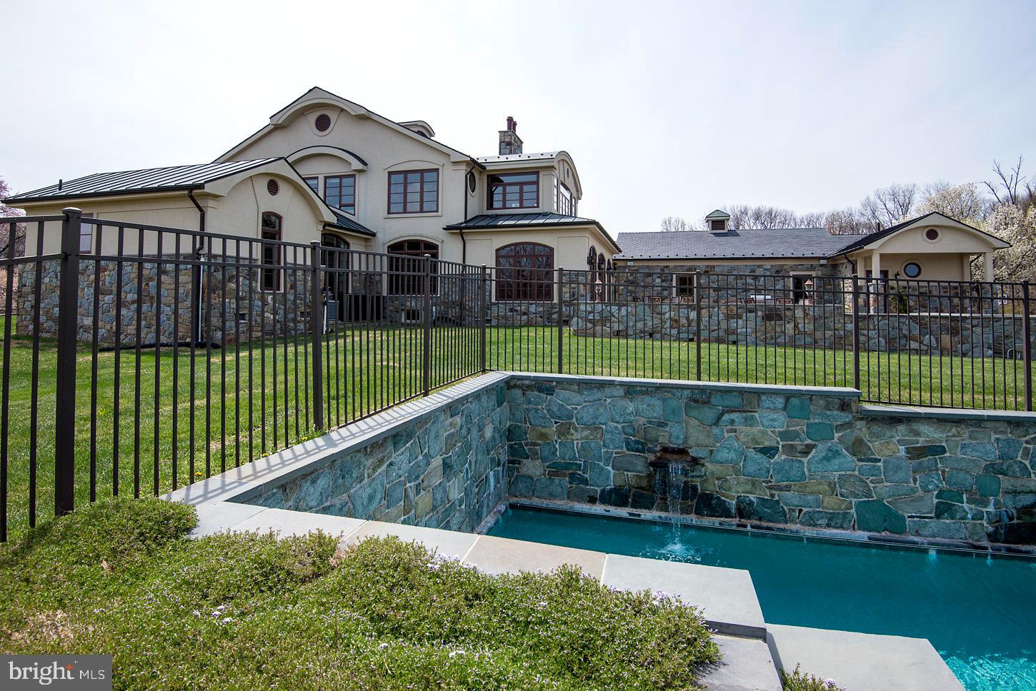 16704 Thurston Road Dickerson, MD 20842 - Photo 83 of 101 a view of a big house with a big yard and potted plants