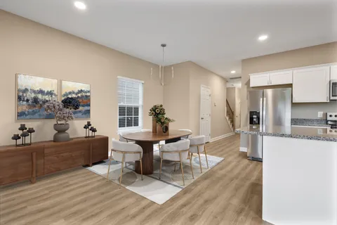 a living room with furniture and a table