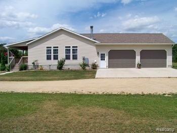 205 Nugent Road Bad Axe, MI 48413 - Photo 8 of 8 Generous 2.5 attached garage.jpg