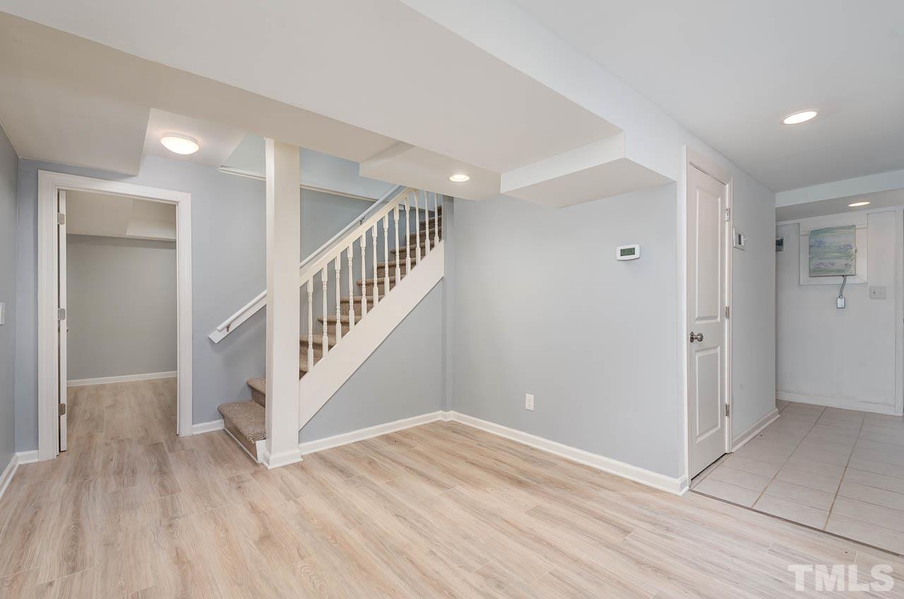 1703 Fountain Ridge Road Chapel Hill, NC 27517 - Photo 23 of 35 a view of an entryway with wooden floor