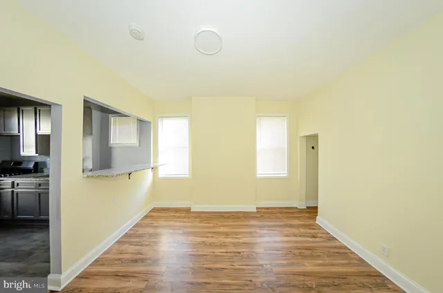 a bathroom with a tub and a sink