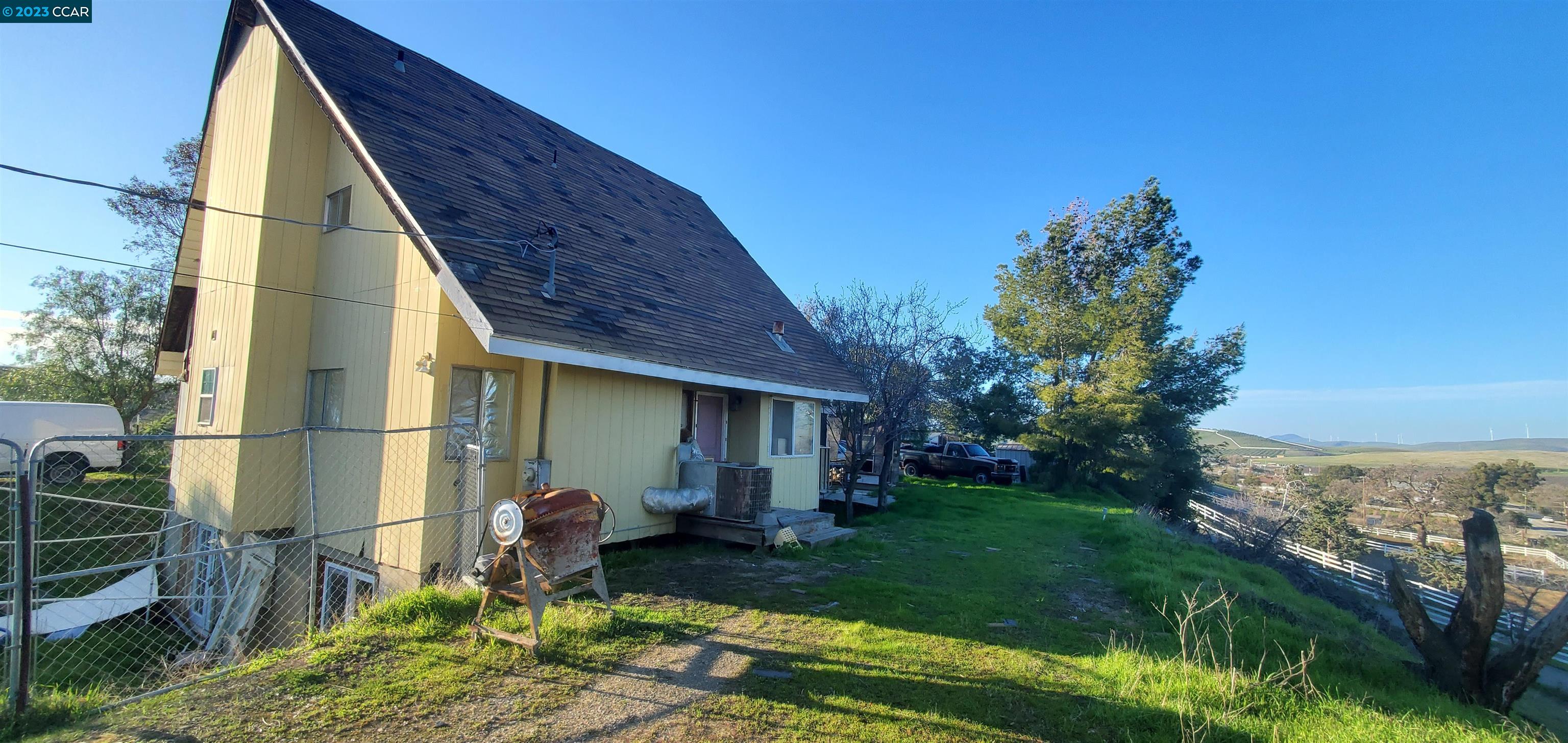 10041 Tesla Road Livermore, CA 94550 - Photo 1 of 1 a view of backyard of house and garden