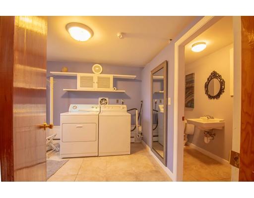 45 Preston Road Attleboro, MA 02703 - Photo 11 of 28 a bathroom with a sink and a mirror