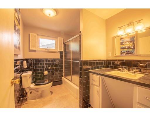 45 Preston Road Attleboro, MA 02703 - Photo 15 of 28 a bathroom with a sink and a bathtub