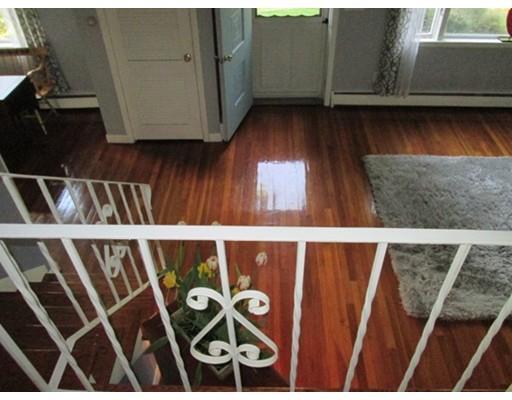 45 Preston Road Attleboro, MA 02703 - Photo 18 of 28 a view of walk in closet with wooden floor