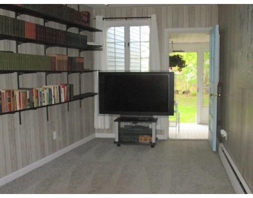 45 Preston Road Attleboro, MA 02703 - Photo 26 of 28 a living room with furniture and a flat screen tv