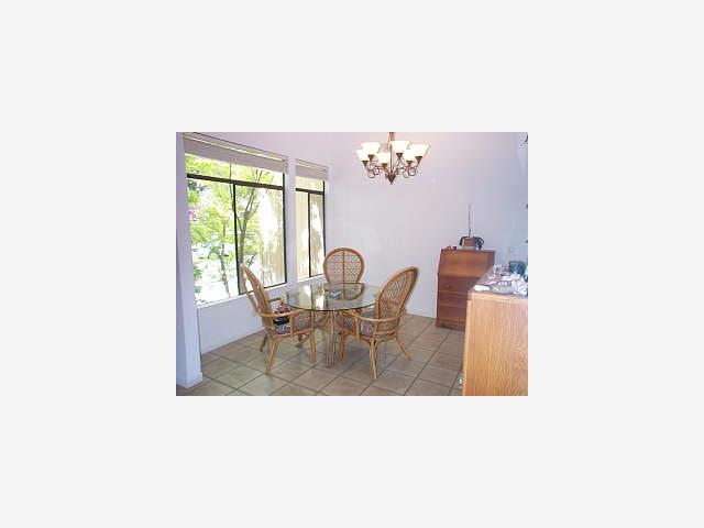 1 Berkeley Court Santa Cruz, CA 95062 - Photo 2 of 6 a living room with furniture and a table