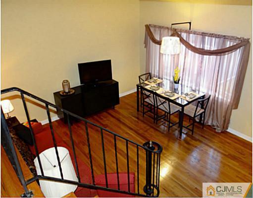 786 Old Raritan Road Edison, NJ 08820 - Photo 10 of 17 a view of a chairs and table in the balcony