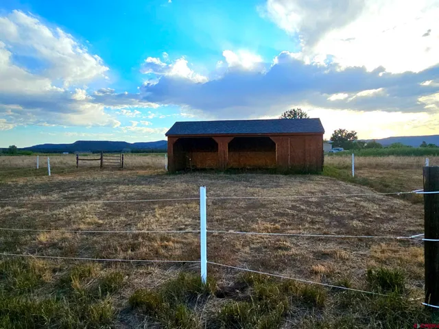 a view of a lake with a mountain in the background