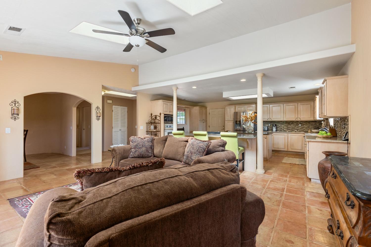 13587 Garden Bar Road Grass Valley, CA 95949 - Photo 13 of 70 a living room with furniture and a view of kitchen