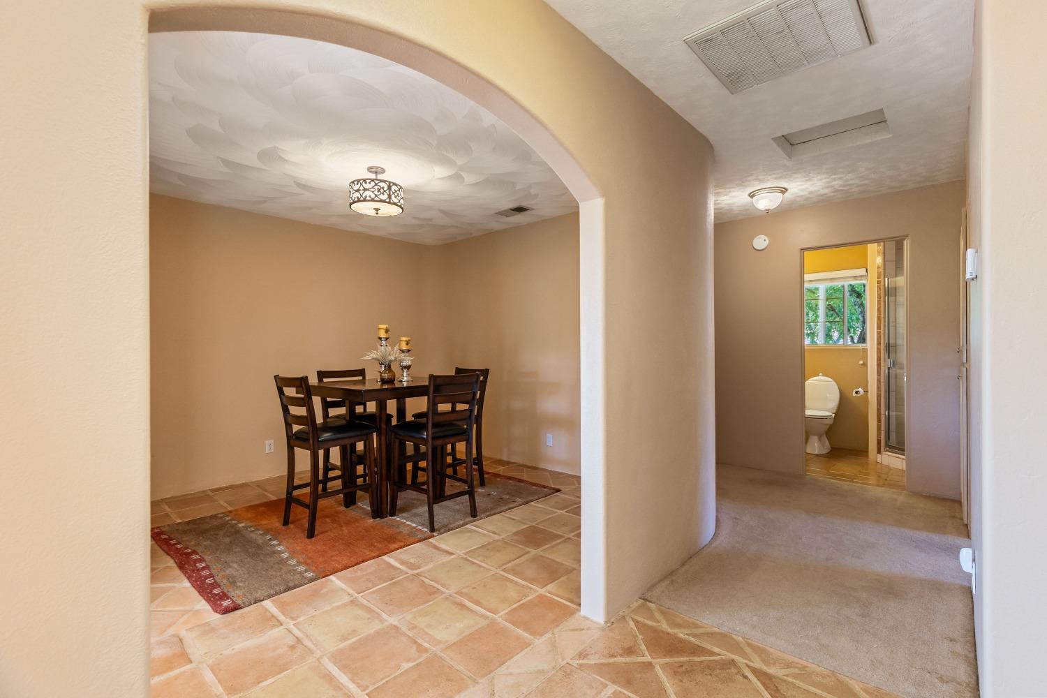 13587 Garden Bar Road Grass Valley, CA 95949 - Photo 14 of 70 a view of a dining room with furniture